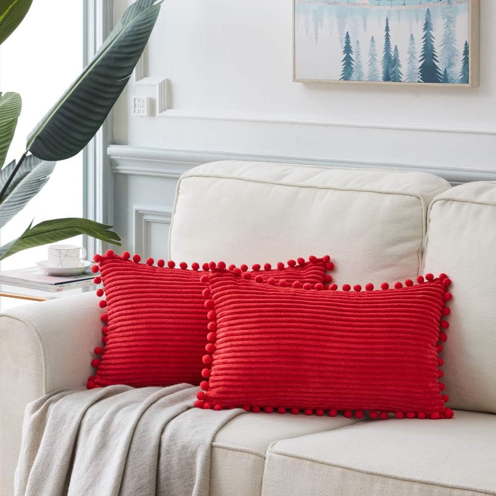 Fancy Homi Pack of 2 Christmas Rectangle Decorative Throw Pillow Covers with Pom-poms, Soft Corduroy Accent Solid Cushion Case Set for Couch Sofa Bedroom Car Living Room (14x24 Inch/35x60 cm, Red)