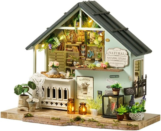 TuKIIE DIY Miniature House Kit with Furniture, 1:24 Scale Creative Room Mini Wooden Dollhouse Book Nook Plus Dust Proof & Music Movement for Kids Teens Adults(Plants Studio)