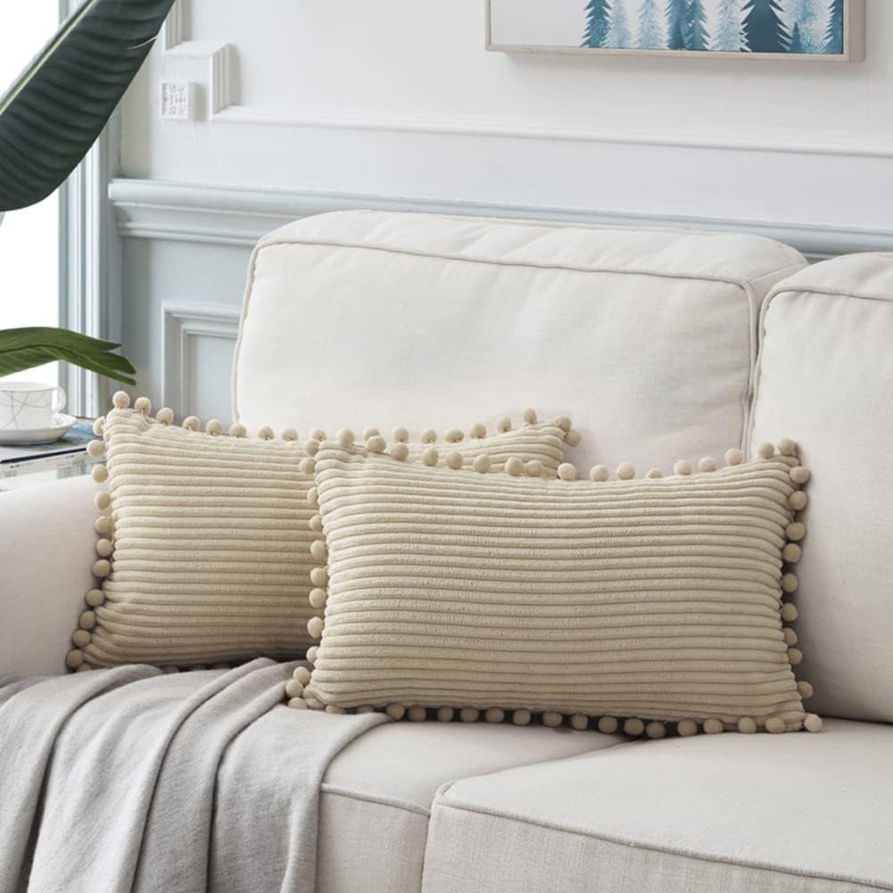Fancy Homi Pack of 2 Tan Lumbar Decorative Throw Pillow Covers with Pom-poms, Soft Corduroy Solid Rectangle Cushion Cases Set for Couch Sofa Bedroom Car Living Room (12x24 Inch/30x60 cm, Beige)