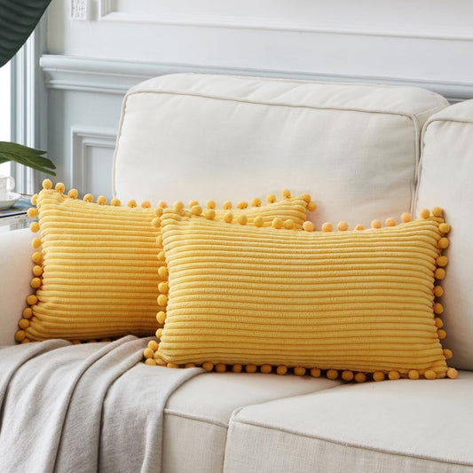 Fancy Homi Pack of 2 Boho Lumbar Decorative Throw Pillow Covers with Pom-poms, Soft Corduroy Solid Rectangle Cushion Cases Set for Couch Sofa Bedroom Car Living Room (12x24 Inch/30x60 cm, Yellow)