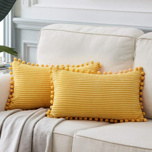 Fancy Homi Pack of 2 Boho Lumbar Decorative Throw Pillow Covers with Pom-poms, Soft Corduroy Solid Rectangle Cushion Cases Set for Couch Sofa Bedroom Car Living Room (12x20 Inch/30x50 cm, Yellow)