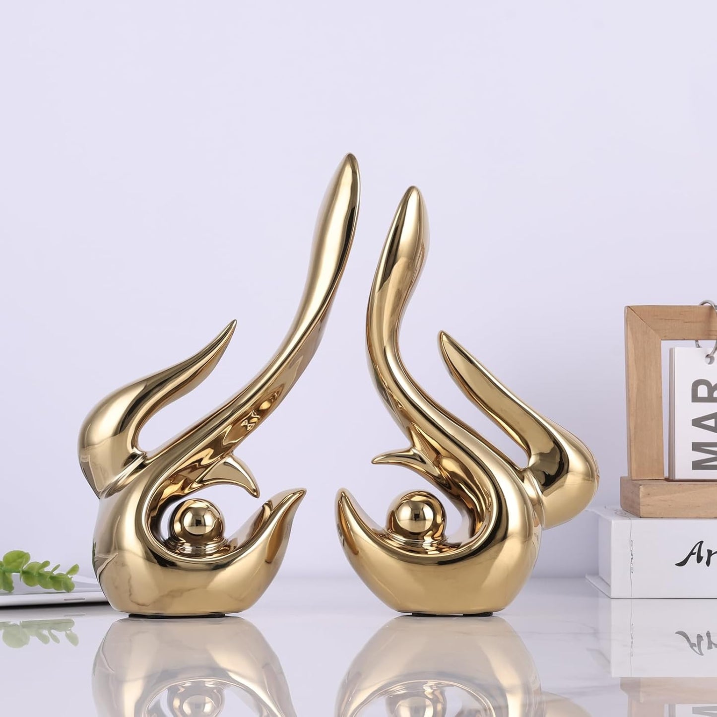 Gold decorative accents, ceramic abstract sculptures and statues, modern art mid century decorative coffee table living room dining room table bedroom office home shelves fireplace countertop decor.