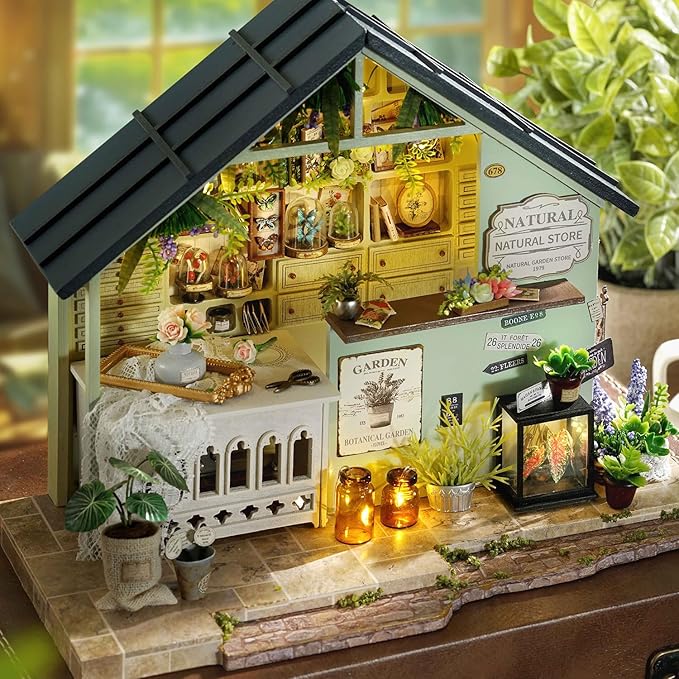 TuKIIE DIY Miniature House Kit with Furniture, 1:24 Scale Creative Room Mini Wooden Dollhouse Book Nook Plus Dust Proof & Music Movement for Kids Teens Adults(Plants Studio)